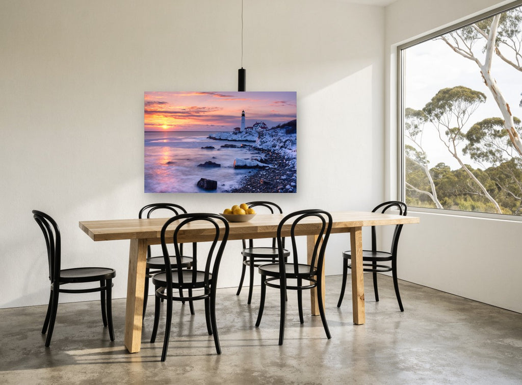 Winter Dawn Lighthouse coastal canvas print on the wall of a dining room