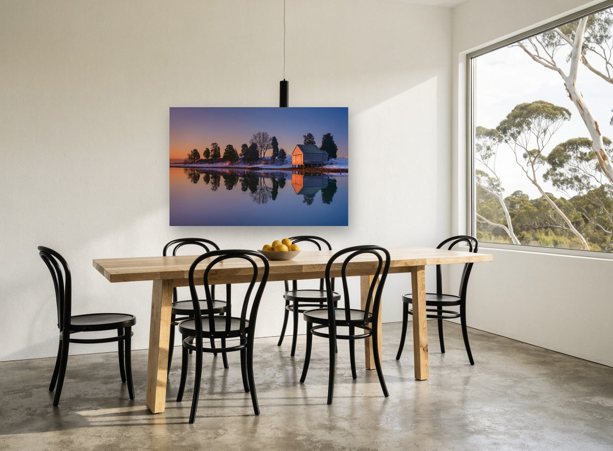 Dusk Boathouse Reflection landscape canvas print on the wall of a dining room