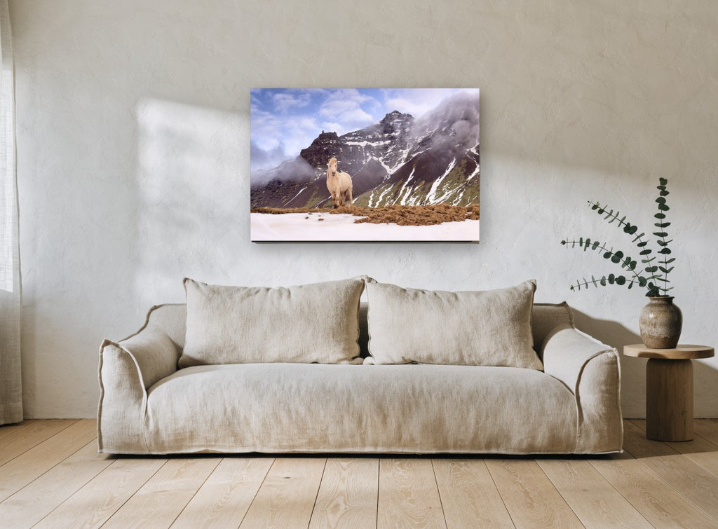 Pale Horse Snow Ridge landscape canvas print on the wall of a living room