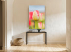 Blushing Tulip Bud floral canvas print on the wall of a hallway