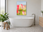 Blushing Tulip Bud floral canvas print on the wall of a bathroom