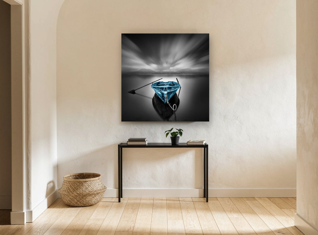 Blue Boat Still Water coastal canvas print on the wall of a hallway