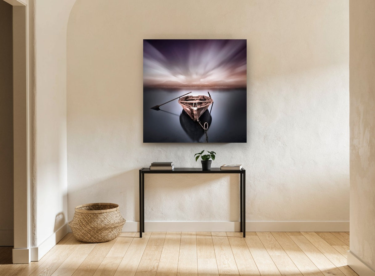 Moored Rowboat at Dusk coastal canvas print on the wall of a hallway