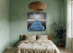 Blue Jetty Stillness coastal canvas print on the wall of a bedroom