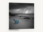 Blue Chair Storm Beach, blue beach chair stormy black and white, coastal canvas wall art print ready to hang