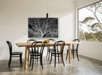 Silver Branch Canopy floral canvas print on the wall of a dining room