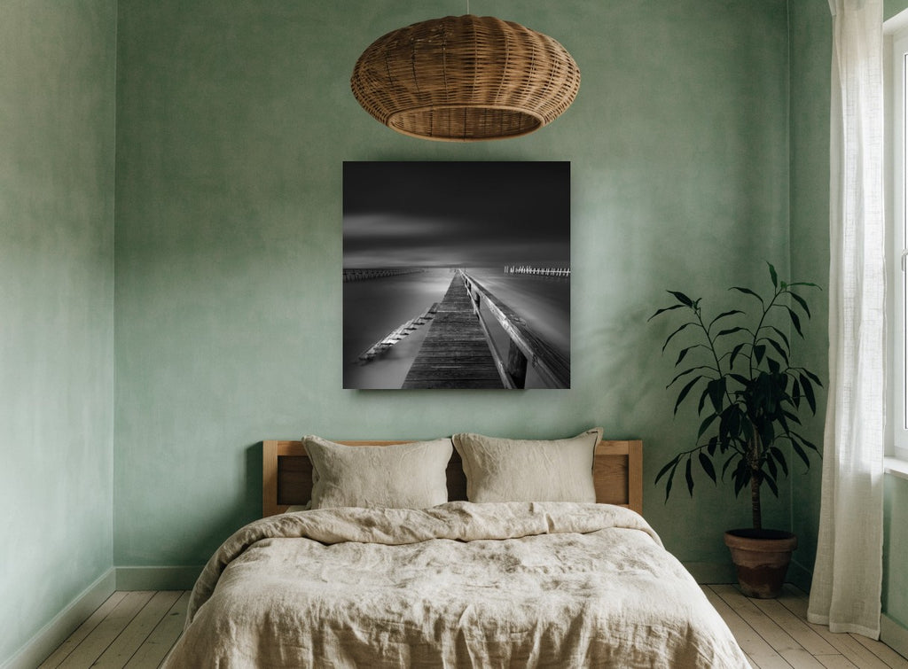 Silent Jetty Noir coastal canvas print on the wall of a bedroom