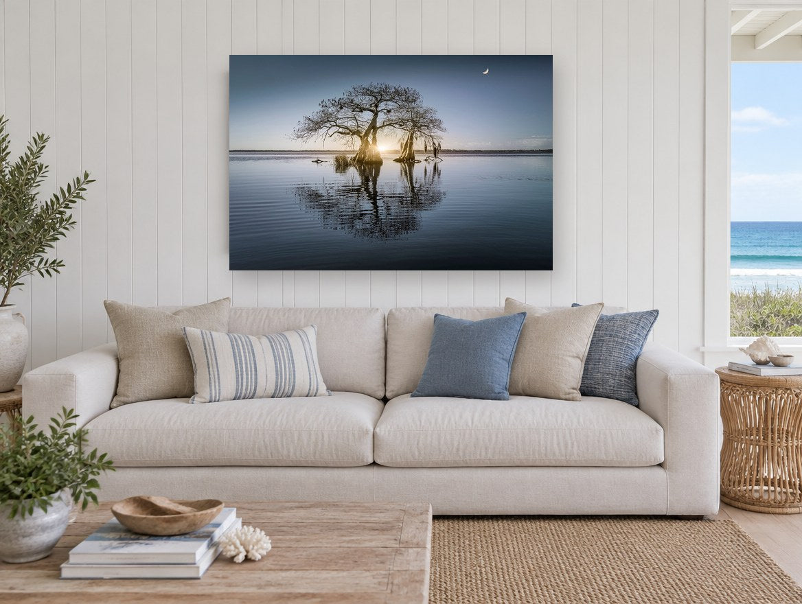 Moonrise Over Still Water landscape canvas print on the wall of a beach house living room