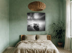 Moored Rowboat Stillness coastal canvas print on the wall of a bedroom