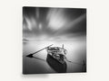 Moored Rowboat Stillness, moored rowboat black and white photograph, coastal canvas wall art print ready to hang
