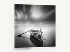 Moored Rowboat Stillness, moored rowboat black and white photograph, coastal canvas wall art print ready to hang