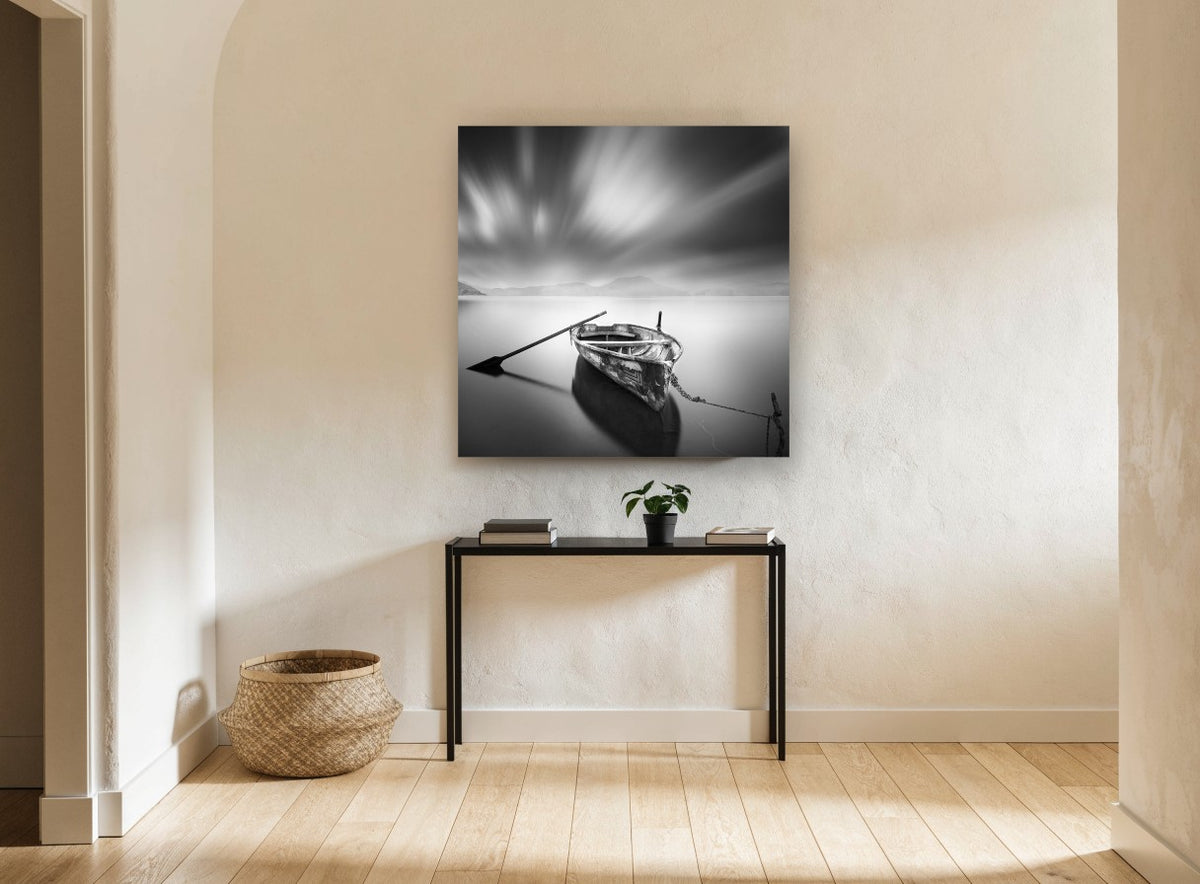 Moored Rowboat Stillness coastal canvas print on the wall of a hallway