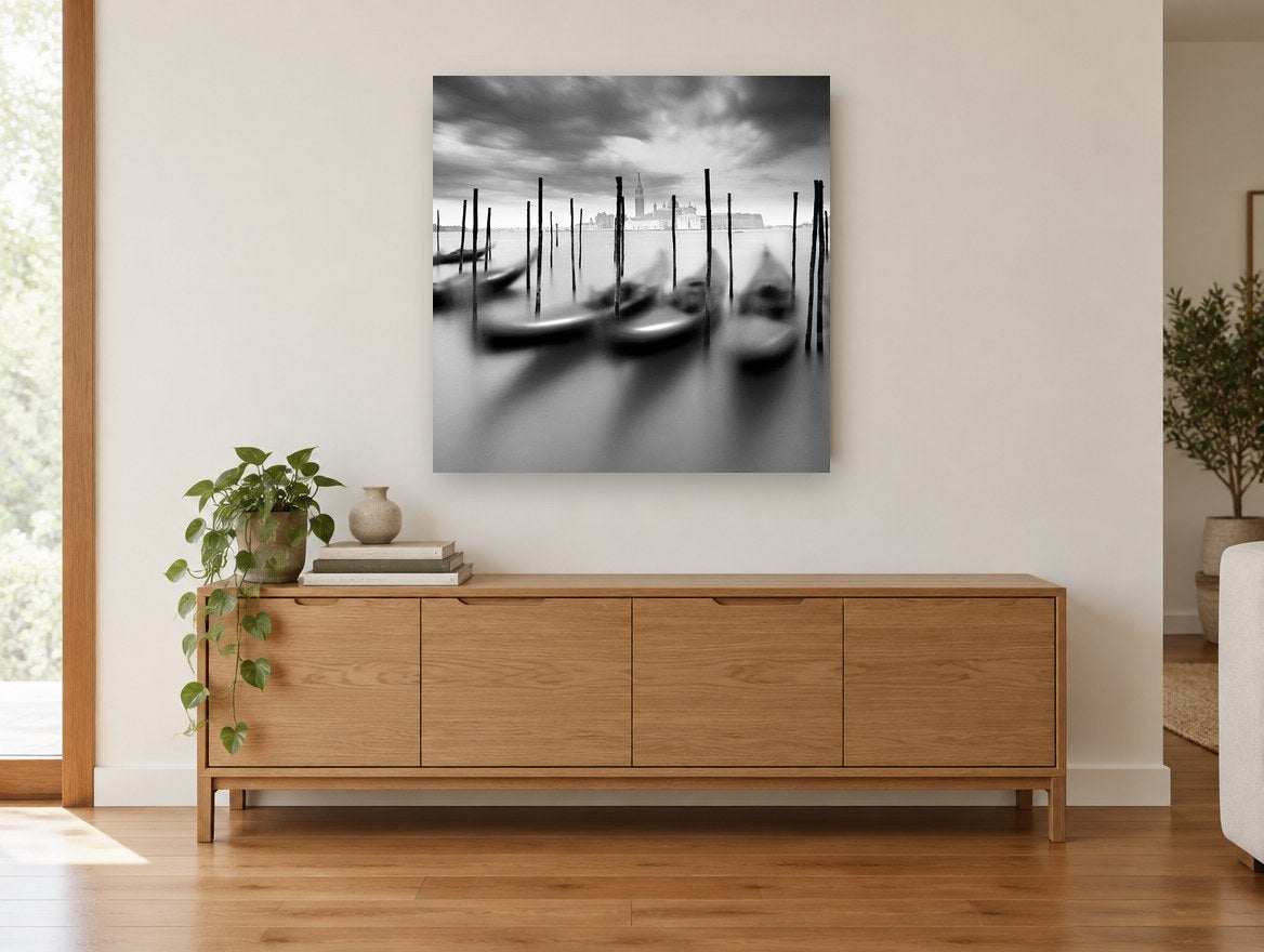 Gondolas at Dusk Mooring coastal canvas print on the wall of a living room above a sideboard