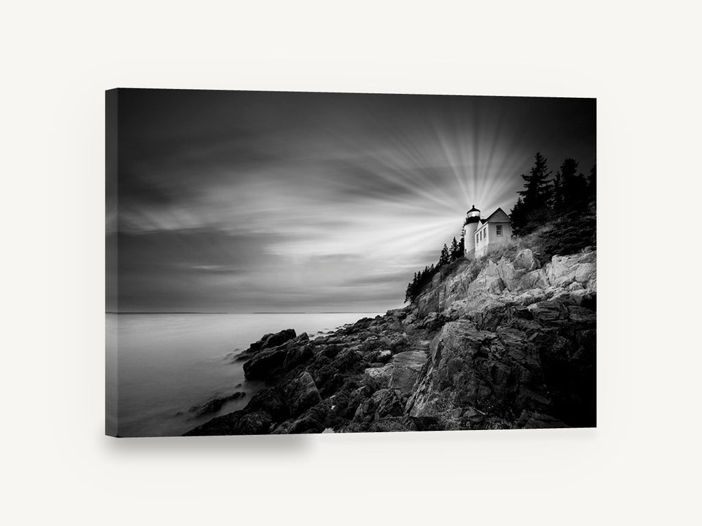 Beam Over the Rocks, lighthouse on rocky coast black and white, coastal canvas wall art print ready to hang