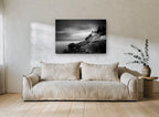 Beam Over the Rocks coastal canvas print on the wall of a living room