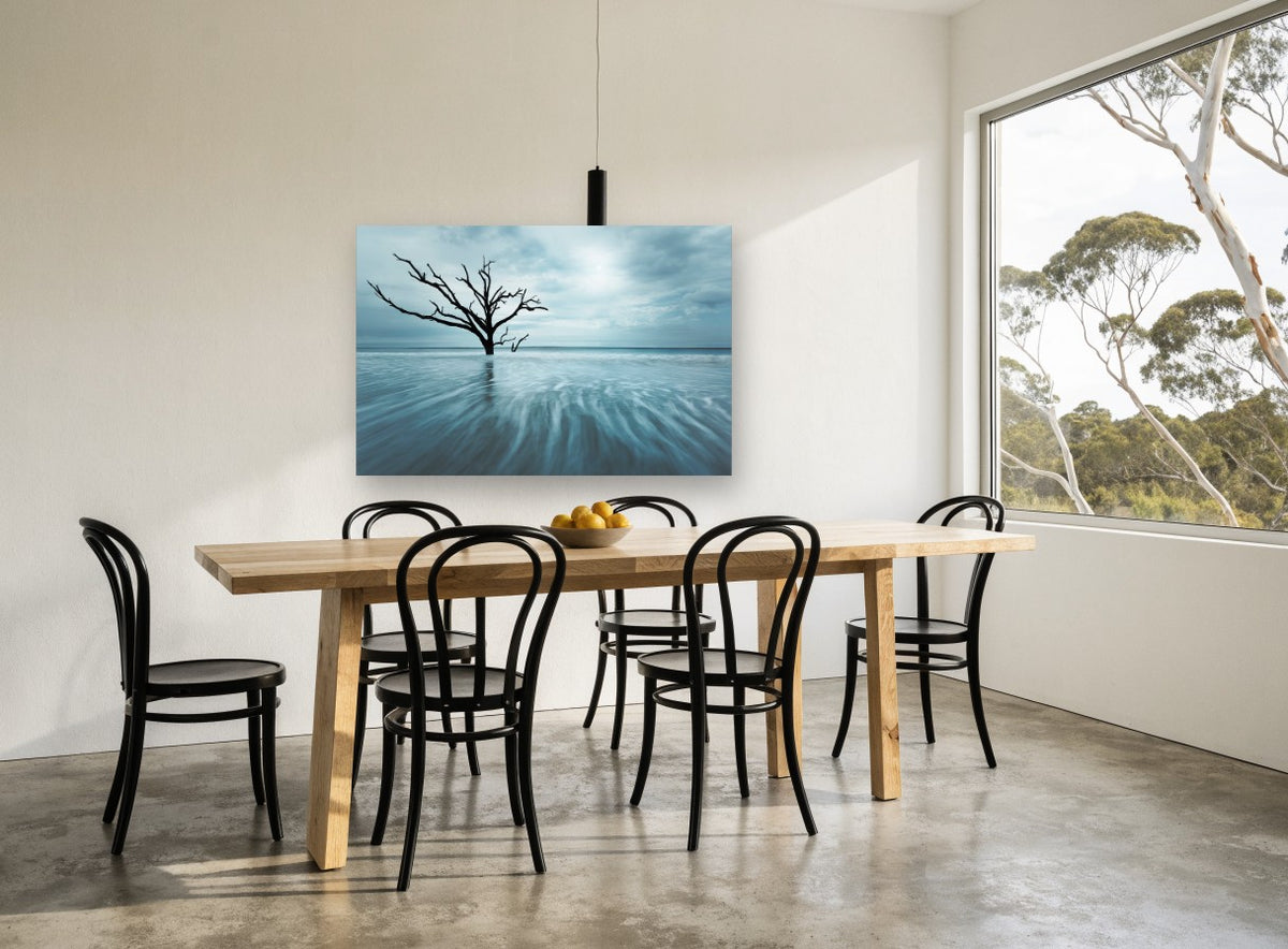 Bare Tree in Blue Tide floral canvas print on the wall of a dining room