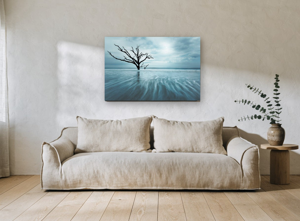 Bare Tree in Blue Tide floral canvas print on the wall of a living room