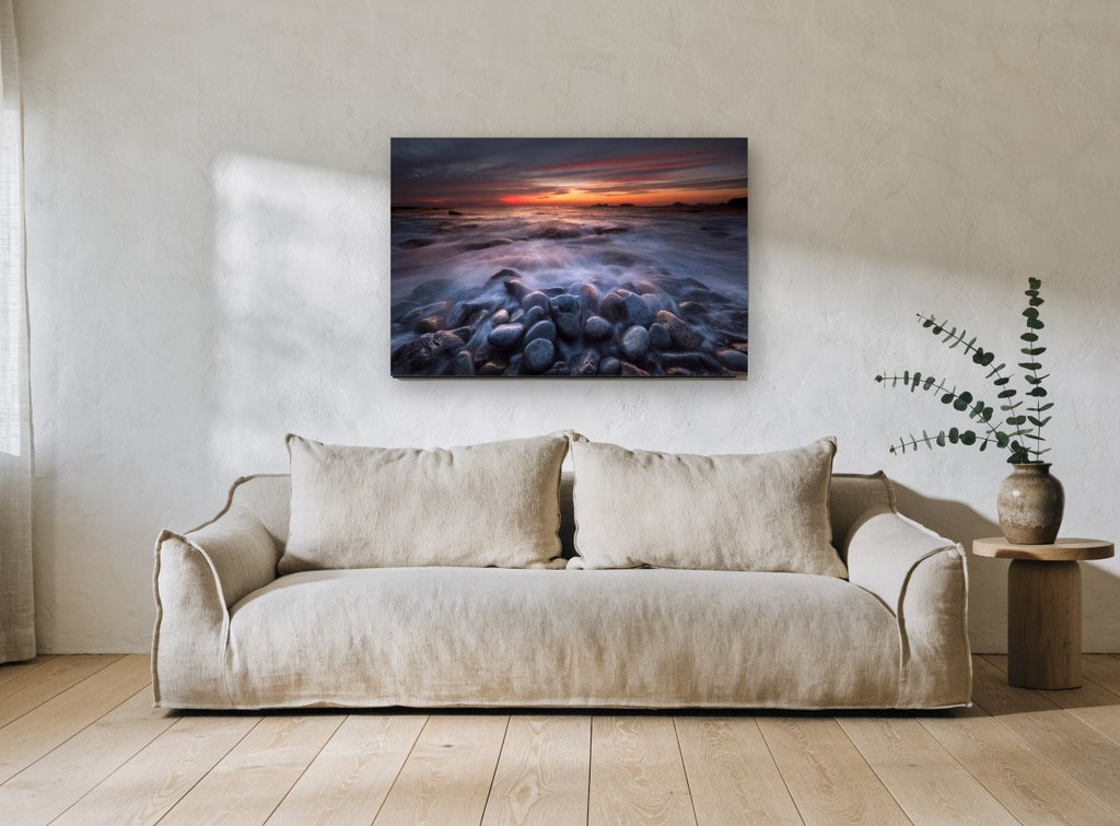 Dusk Surf Over Pebbles landscape canvas print on the wall of a living room