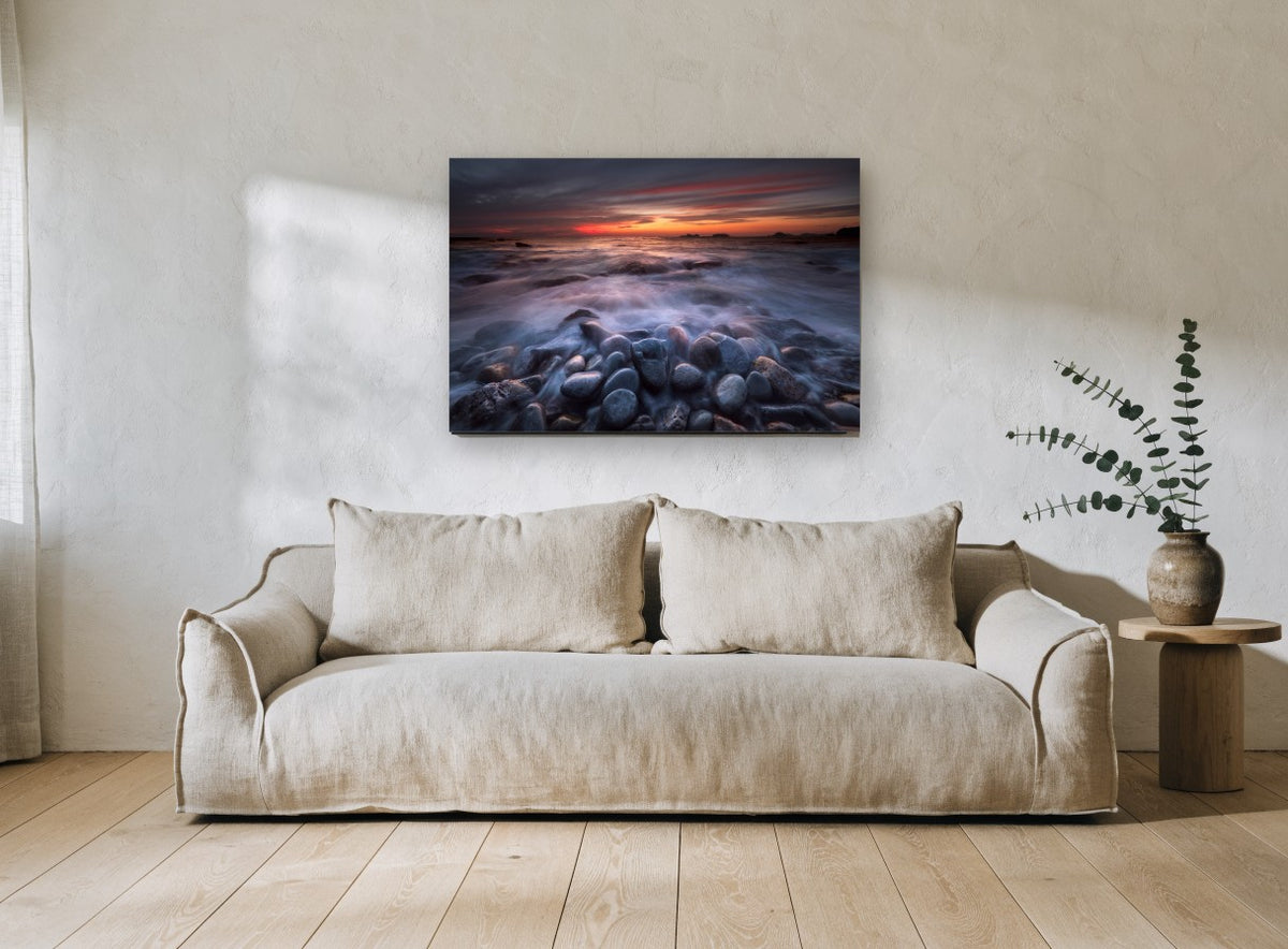 Dusk Surf Over Pebbles landscape canvas print on the wall of a living room