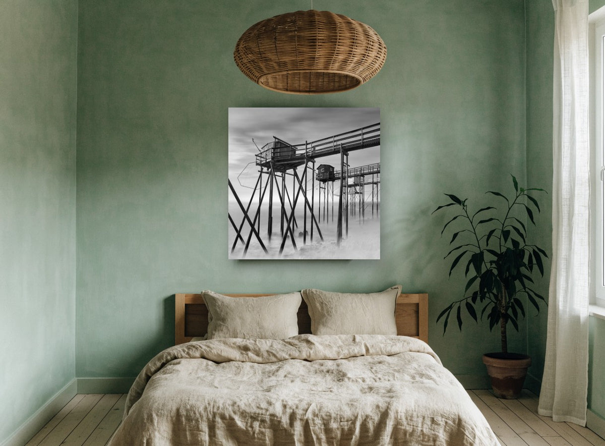 Stilted Fishing Huts coastal canvas print on the wall of a bedroom