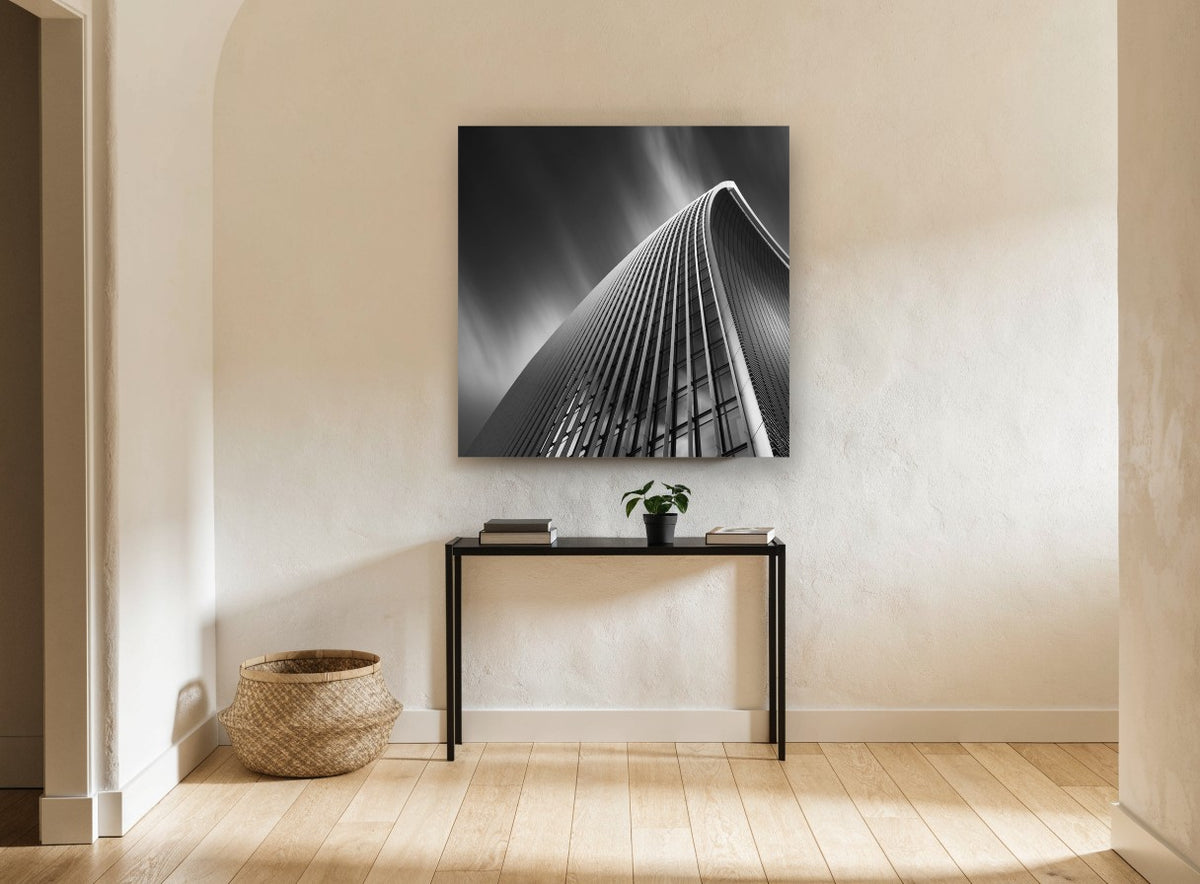 Curved Tower Streaks city canvas print on the wall of a hallway