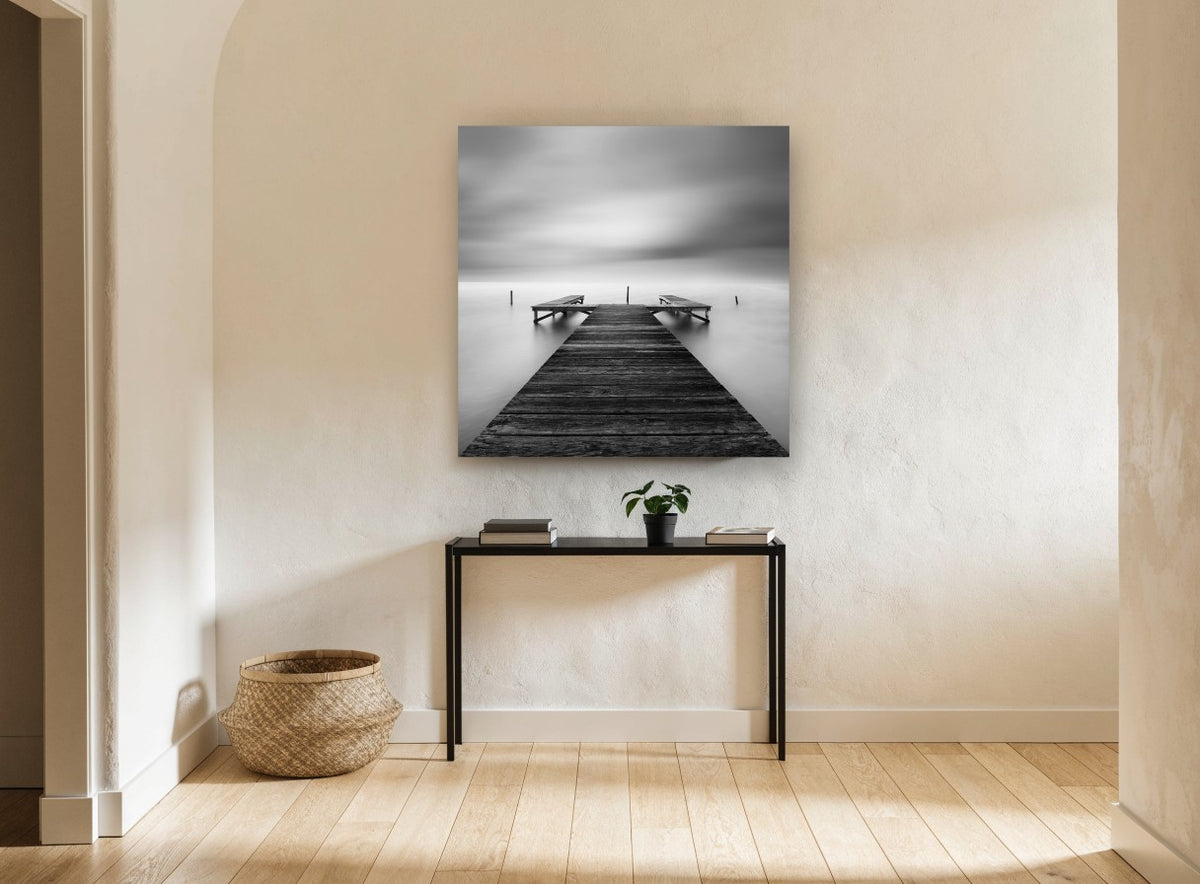 Still Water Jetty coastal canvas print on the wall of a hallway