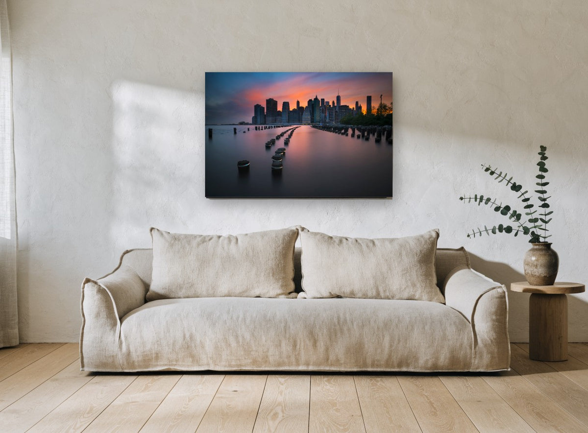 Pilings at Manhattan Dusk city canvas print on the wall of a living room