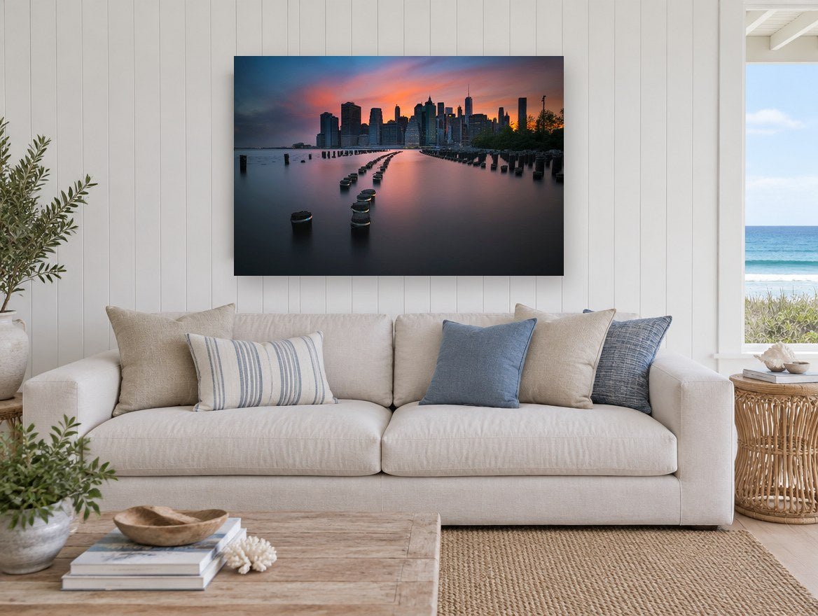 Pilings at Manhattan Dusk city canvas print on the wall of a beach house living room