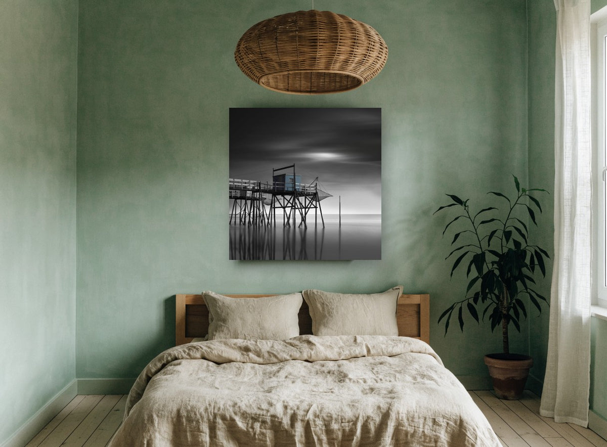 Blue Fishing Hut Stilts coastal canvas print on the wall of a bedroom