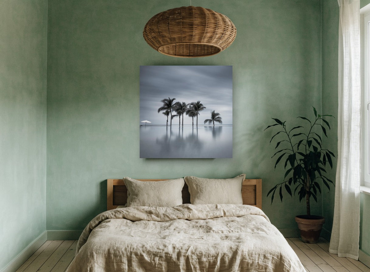 Still Water Palms coastal canvas print on the wall of a bedroom