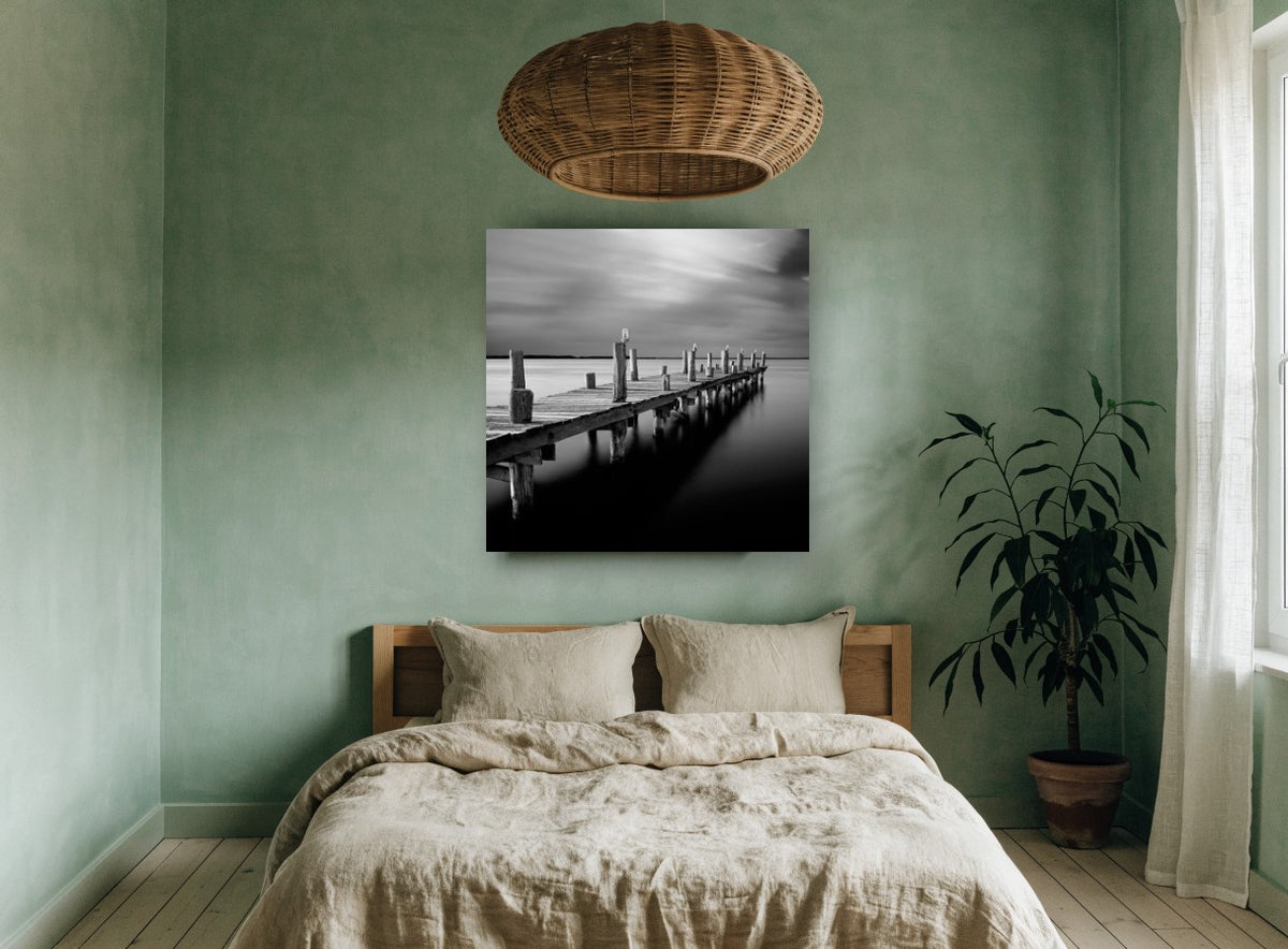 Silent Jetty Dusk coastal canvas print on the wall of a bedroom