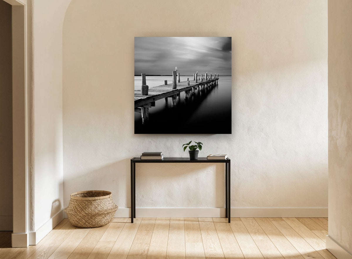 Silent Jetty Dusk coastal canvas print on the wall of a hallway