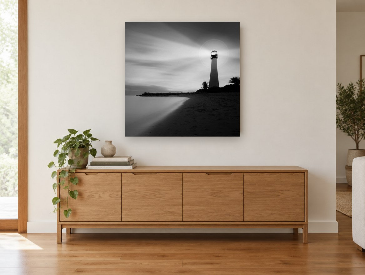Beacon on the Shore coastal canvas print on the wall of a living room above a sideboard