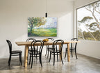 Meadow Under the Oak floral canvas print on the wall of a dining room