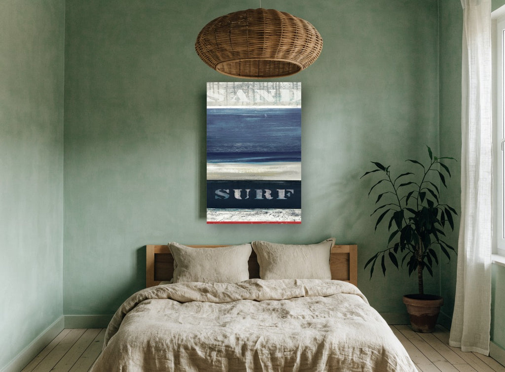 Sand and Surf Stripes coastal canvas print on the wall of a bedroom