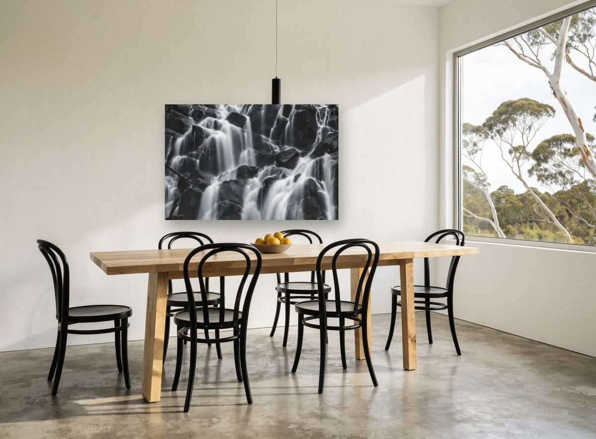 Silken Cascade Rocks landscape canvas print on the wall of a dining room