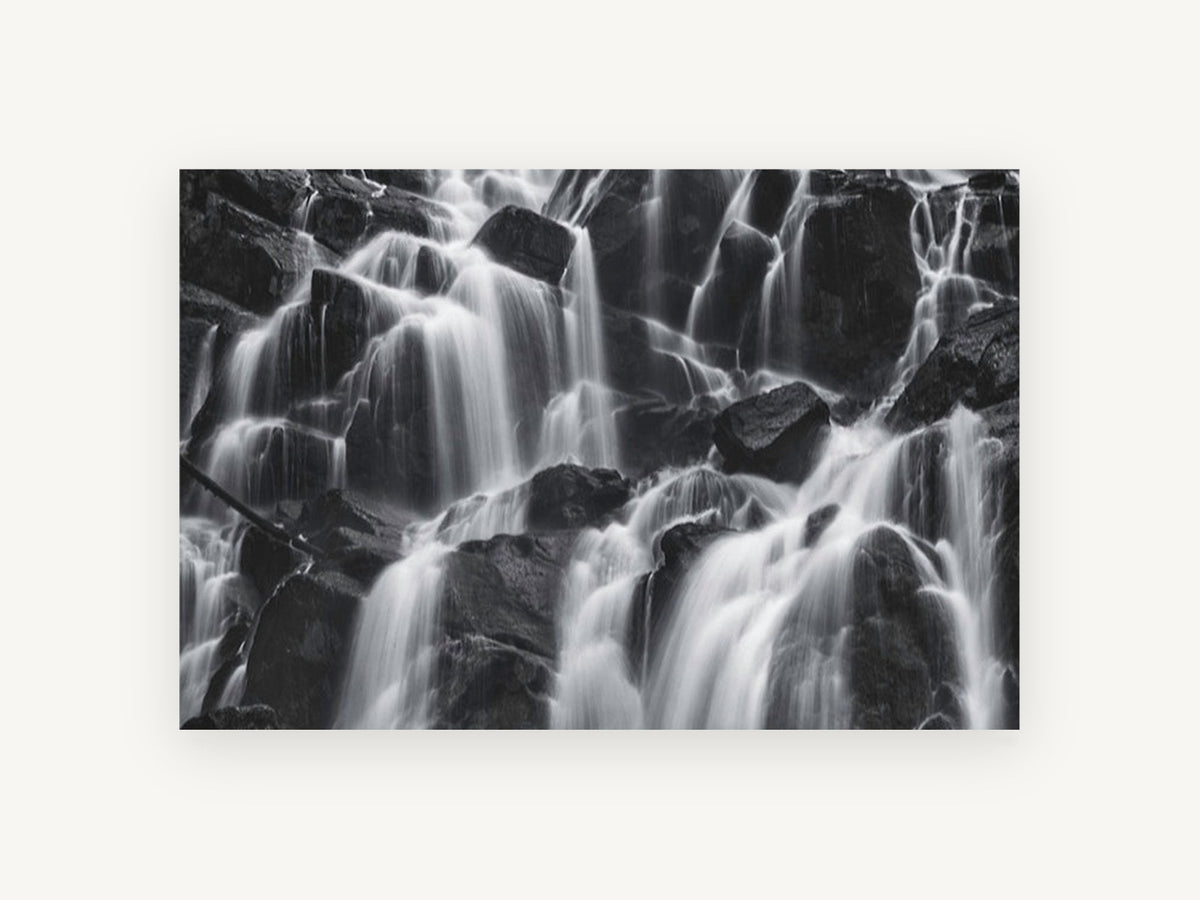 Silken Cascade Rocks, black and white waterfall photograph, landscape canvas wall art print, front view