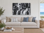 Silken Cascade Rocks landscape canvas print on the wall of a beach house living room