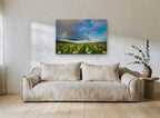 Rainbow Over Sunflowers floral canvas print on the wall of a living room