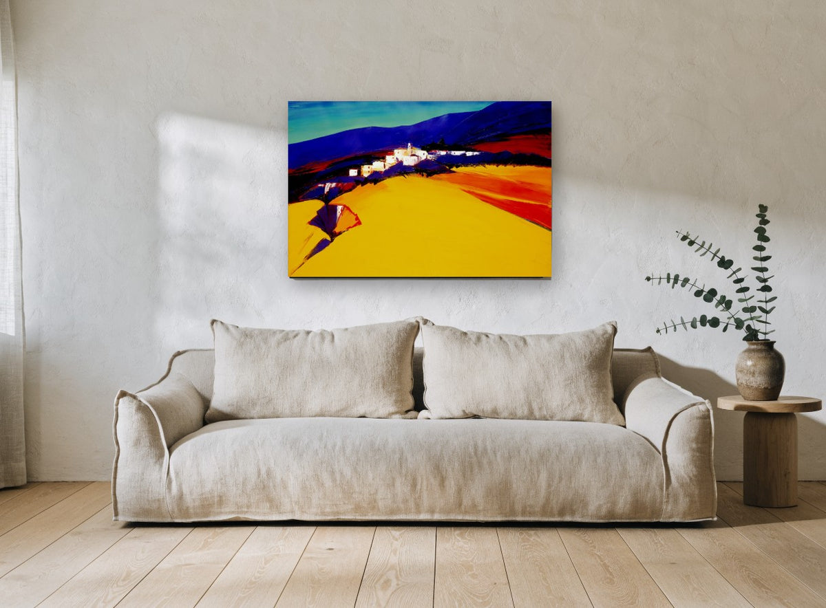 Golden Hillside Village landscape canvas print on the wall of a living room