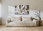 White Star Magnolia floral canvas print on the wall of a living room