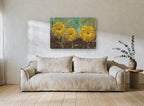 Three Golden Blooms floral canvas print on the wall of a living room