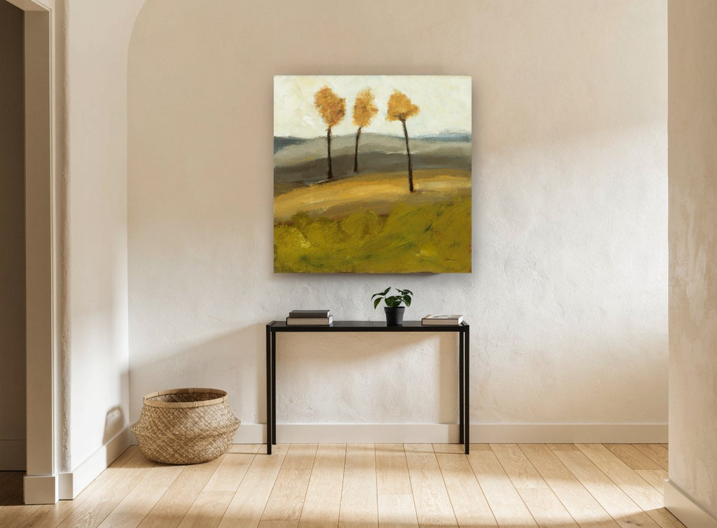 Three Amber Trees floral canvas print on the wall of a hallway