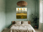Three Golden Trees floral canvas print on the wall of a bedroom