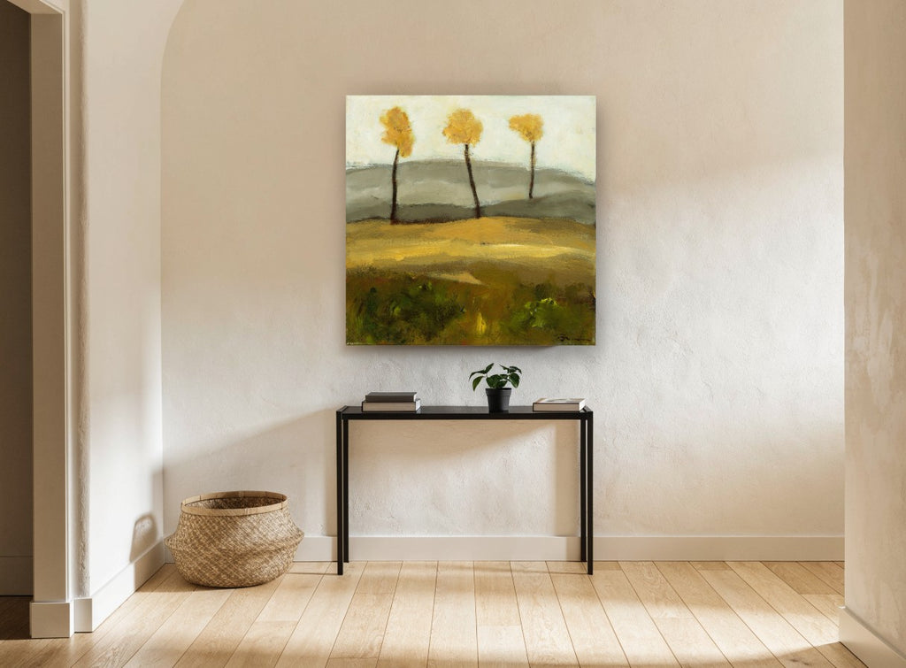Three Golden Trees floral canvas print on the wall of a hallway