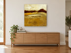 Golden Field Dusk floral canvas print on the wall of a living room above a sideboard