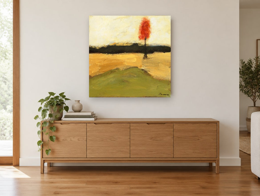Lone Red Tree floral canvas print on the wall of a living room above a sideboard