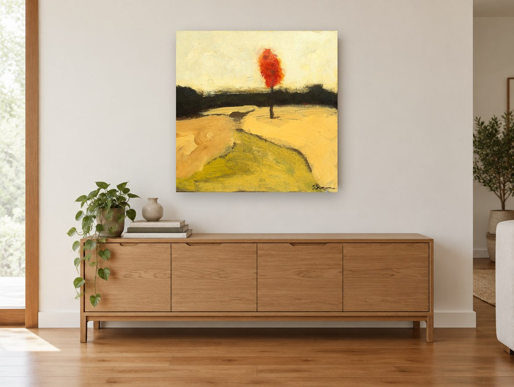 Lone Red Tree floral canvas print on the wall of a living room above a sideboard