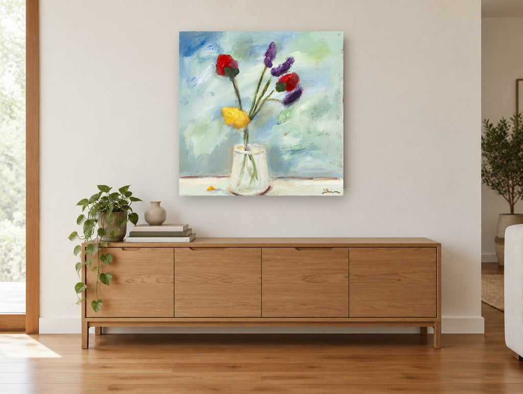 Bright Blooms in Glass floral canvas print on the wall of a living room above a sideboard