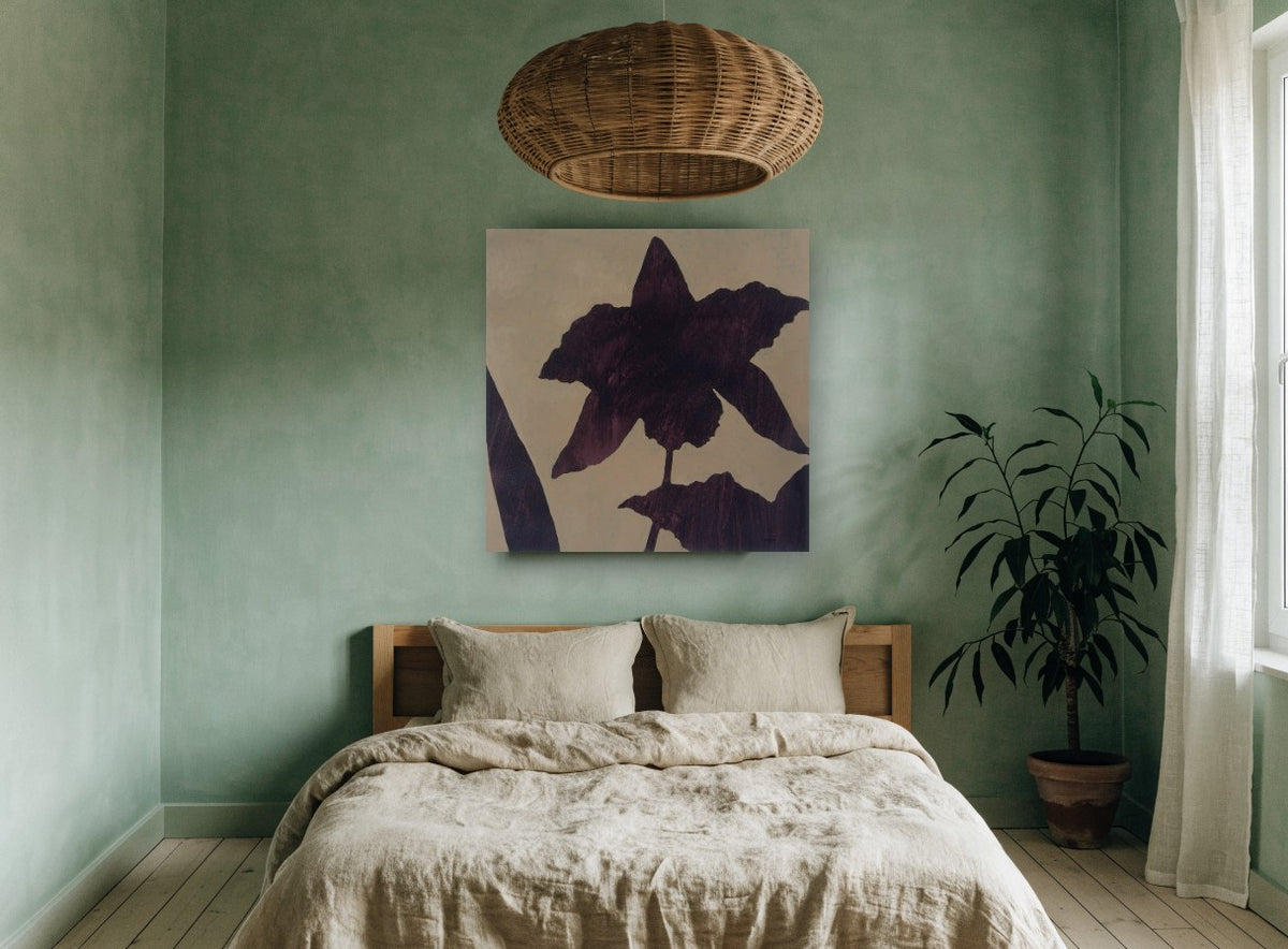 Aubergine Orchid Silhouette floral canvas print on the wall of a bedroom